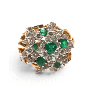 Królewski pierścień z diamentami i szmaragdami